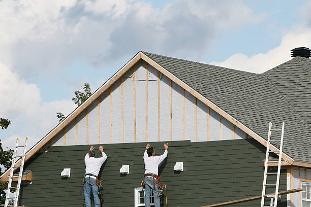 Professional Siding technician working in Petersburg, IN